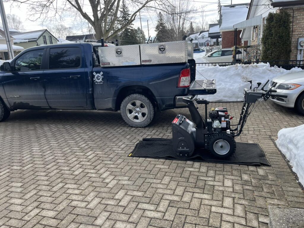 Mobile snowblower repair at a home